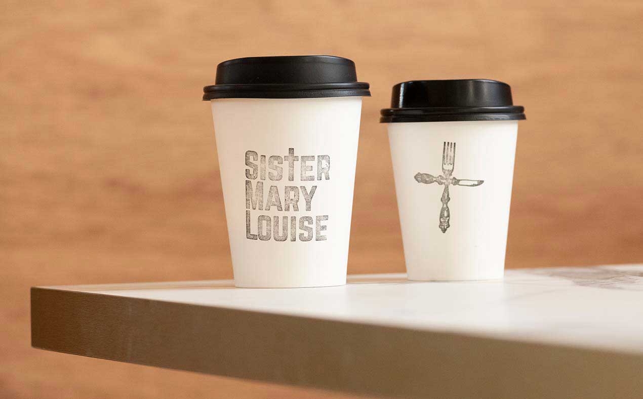 Sister Mary Louise cafe coffee cup logo and branding.