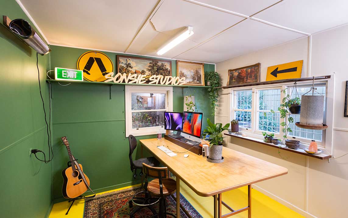 Desk and workspace of Paul Sonsie at Sonsie Studios.